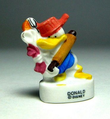Donald Duck with rolling pin Disney porcelain bisque miniature figure