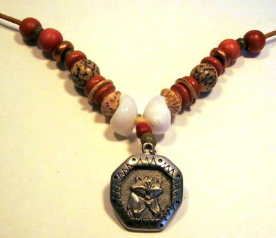 Meeko pendant on beaded cord, from Disney 'Pocahontas'