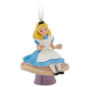 Alice in Wonderland sitting on mushroom ornament