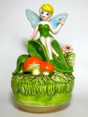 Tinker Bell sitting on leaf Disney musical figurine