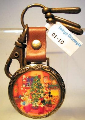 Christmas keychain featuring Mickey, Minnie, Donald, Goofy, Huey, Dewey and Louie