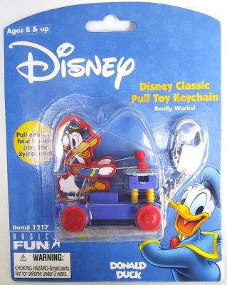 Donald Duck playing the xylophone pull toy keychain