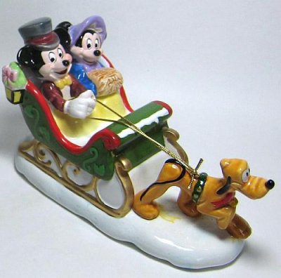 Mickey Mouse and Minnie Mouse on sleigh pulled by Pluto Disney music box