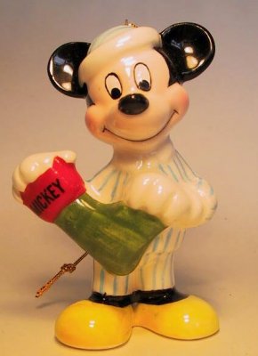 Mickey Mouse in striped pyjamas with red stocking ornament