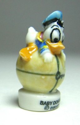 Baby Donald Duck on beachball Disney porcelain miniature figure