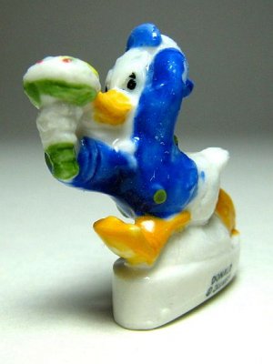 Donald Duck holding flowers Disney porcelain miniature figure