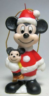 Santa Mickey Mouse holding Mickey Mouse doll ornament