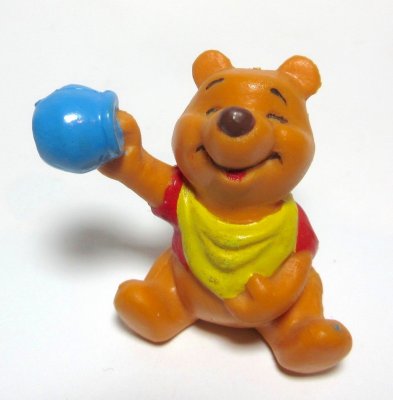 Disney's Winnie the Pooh with blue hunny pot PVC figurine