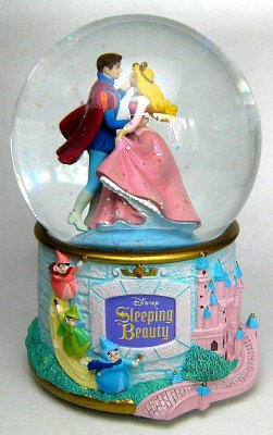 Sleeping Beauty and Prince Phillip dancing at castle musical snowglobe