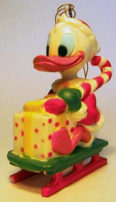 Donald Duck on sled ornament