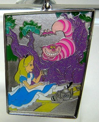 Alice drinking tea with Cheshire Cat in tree colored pewter keychain