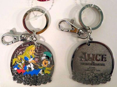 Alice, Mad Hatter, March Hare having tea keychain