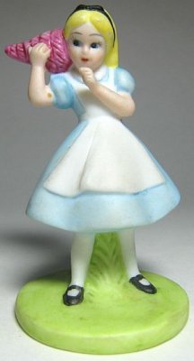 Alice listening to seashell porcelain bisque Disney figurine (Grolier)