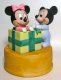 Baby Mickey Mouse opens gift with Minnie Mouse inside bisque Christmas figurine