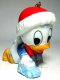 Baby Donald Duck playing with toy car ornament