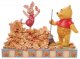 'Jumping into Fall' - Winnie the Pooh and Piglet in leaves figurine (Jim Shore Disney Traditions)