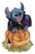 Stitch sitting on pumpkin as vampire for Halloween cookie jar