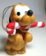 Baby Pluto with candy cane in his mouth ornament