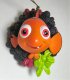 Nemo with wreath ornament (Grolier)
