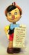 Pinocchio with his letter to Santa ornament (Grolier)