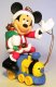 Santa Mickey Mouse sitting on train engine ornament (Grolier)
