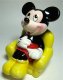 Mickey Mouse in yellow easy chair salt and pepper shaker set