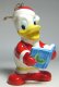 Donald Duck with blue Christmas caroling book ornament