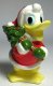 Donald Duck with Christmas tree over his right shoulder ornament