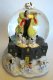 Cruella de Vil and dalmatian puppies musical snowglobe