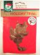 Minnie pressed brass ornament