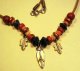 Necklace on beaded leather cord, with leaves and arrowhead, from Disneys' 'Pocahontas'