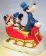 Goofy driving Mickey & Minnie in sleigh music box