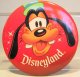 Goofy Disneyland button (orange and stars background)
