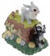 Thumper the rabbit and Flower the skunk on log cookie jar