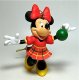 Minnie Mouse with green ball ornament (Grolier)